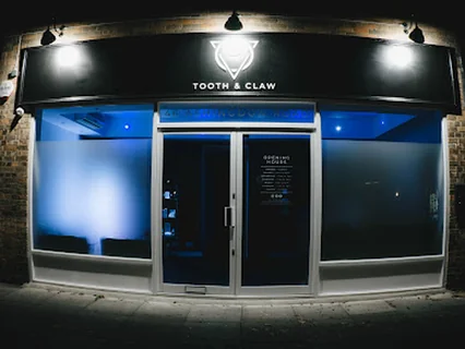 Photo Tooth And Claw Tattoo Studio