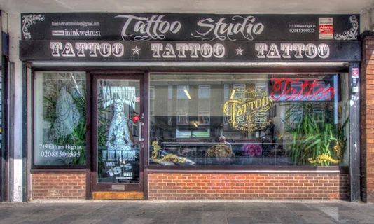 Photo In Ink We Trust Tattoo Shop