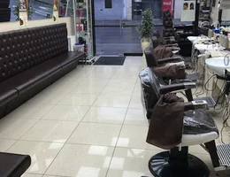 Georges Barbers / ladies Hairdressers upstairs/sunbed